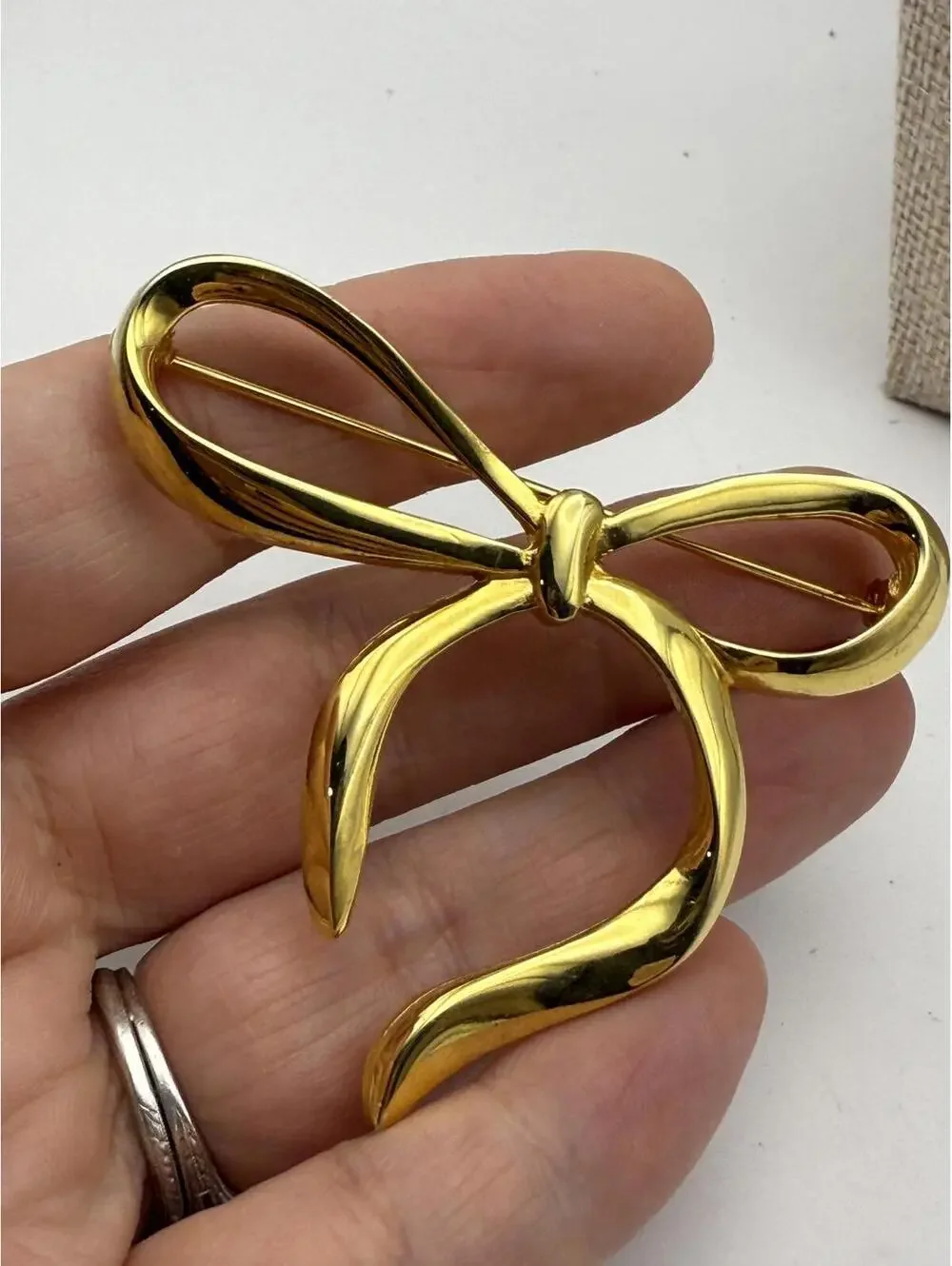Gold Tone Bow Shaped Brooch Pin